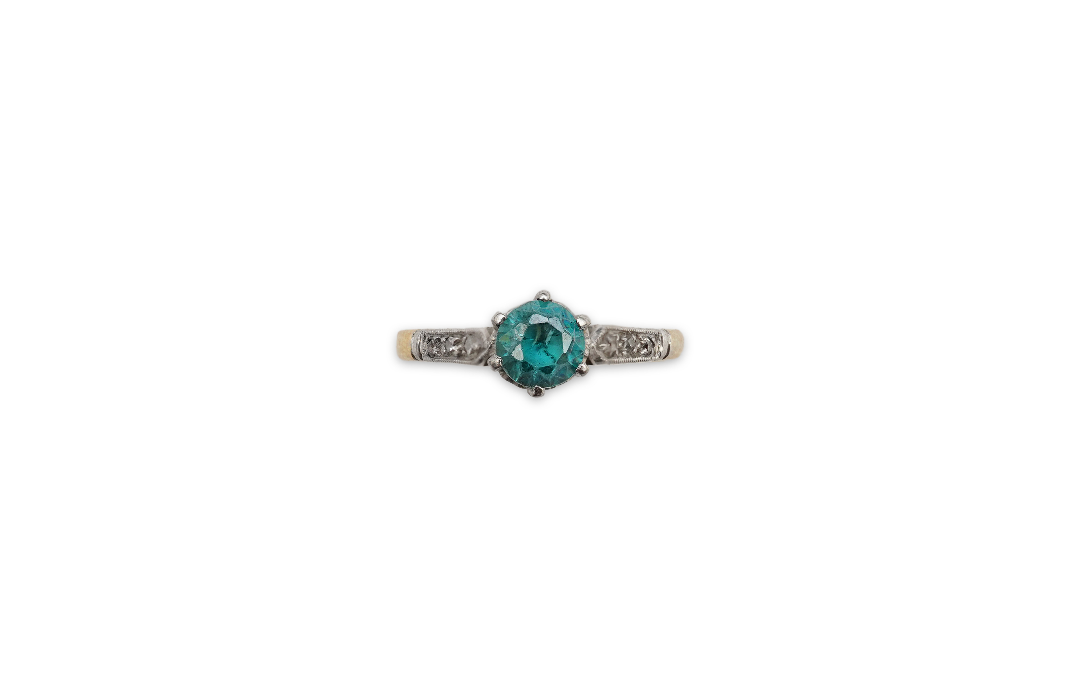 A zircon and diamond ring, mid 20th century, claw-set with a brilliant-cut blue zircon measuring approximately 5mm diameter, to shoulders set with rose-cut diamonds, mounted in gold, size N, stamped 18CT, gross weight ap